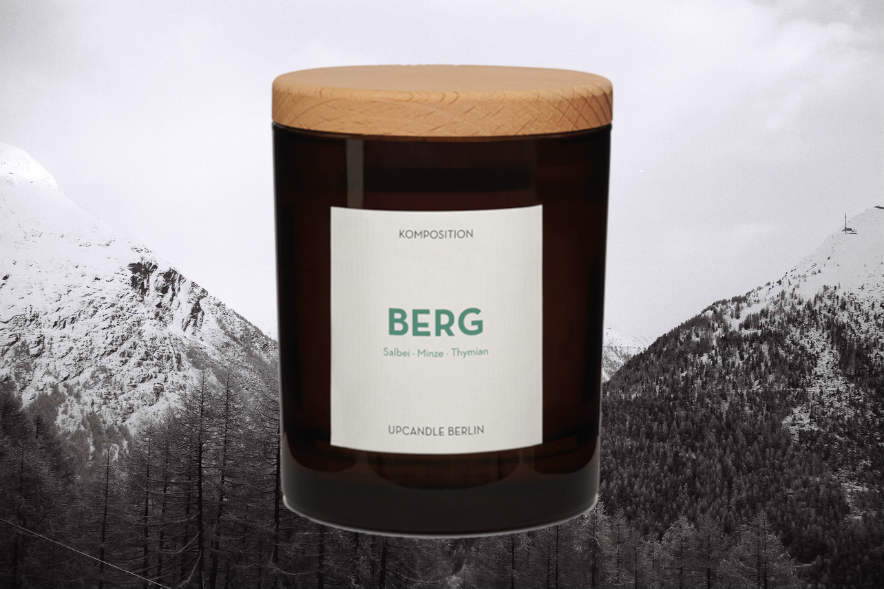 Aromakerze Berg mit Kräuterduft vor beeindruckender Berglandschaft